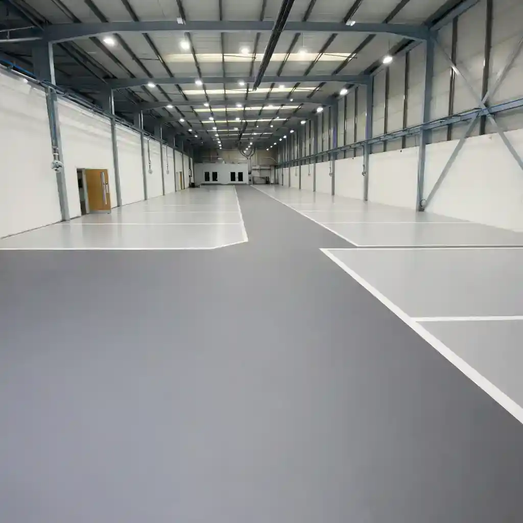 High build epoxy resin floor coating in an industrial unit