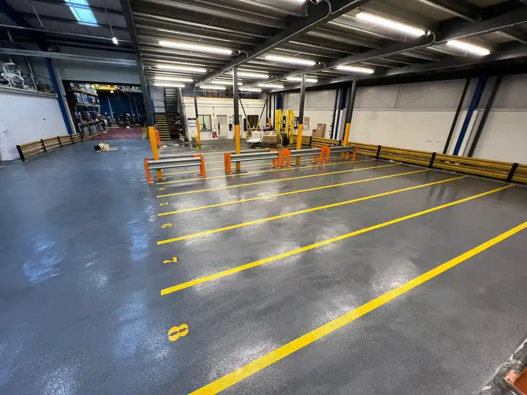 Epoxy and polyurethane resin floor coating in an industrial unit